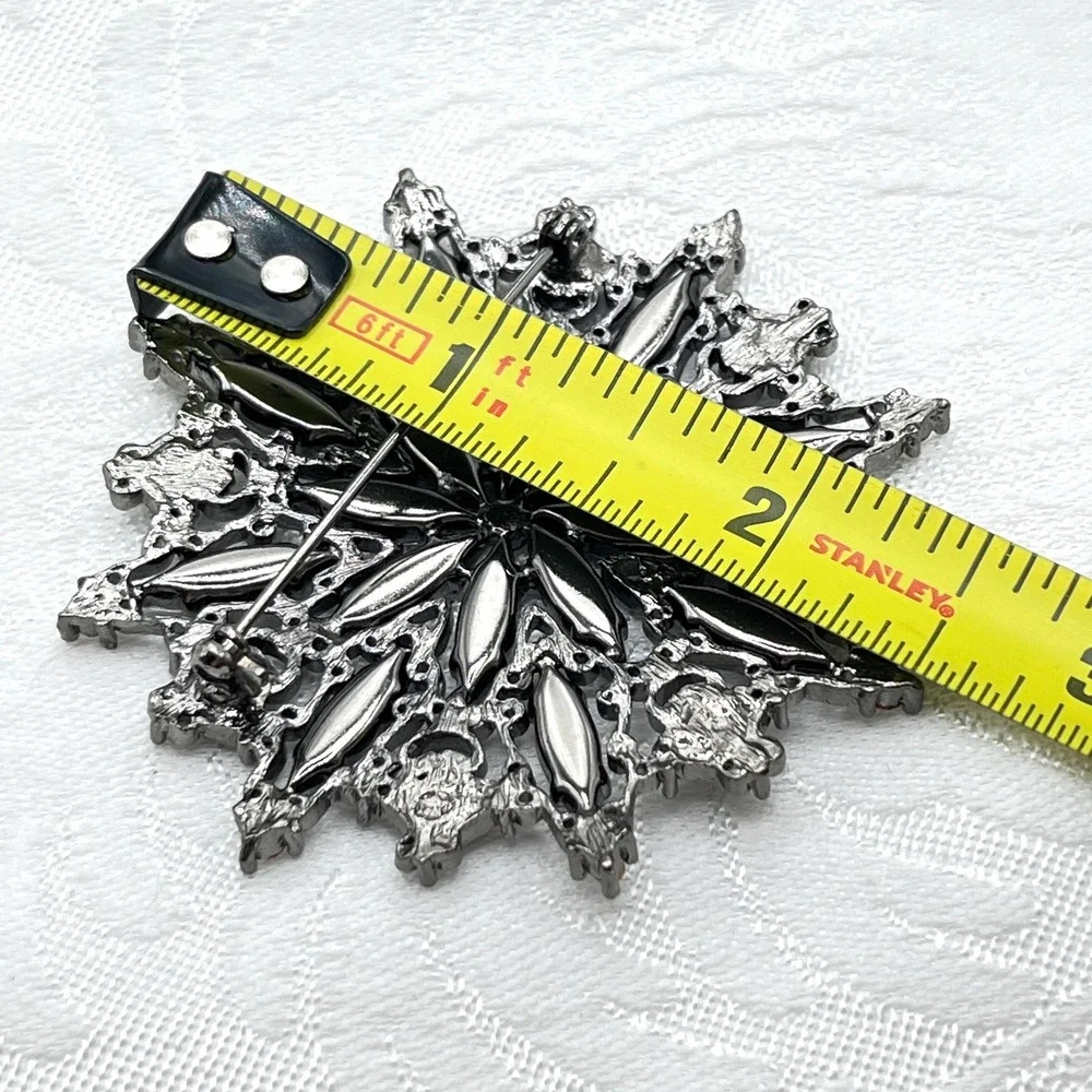 Vintage Clear Ornate Rhinestone Starburst Snowflake Silver Gunmetal Tone Brooch